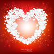Beautiful background  with  red heart made from small white pape