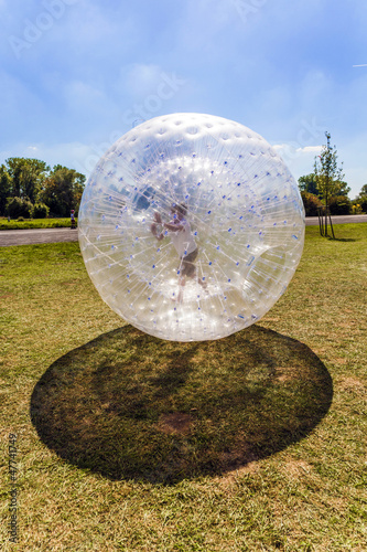 Photo: child has fun in the Zorbing Ball child has fun in the Zorbing Ball