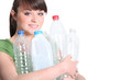 young woman recycling plastic