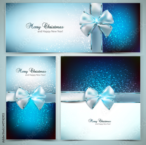 Vector: Elegant Christmas greeting cards with blue bows and place for te Elegant Christmas greeting cards with blue bows and place for te