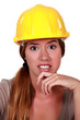 woman wearing helmet looking disgusted