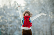 Foto: Young woman in a snowy furry hood Young woman in a snowy furry hood