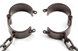 old style medieval handcuffs made of heavy iron