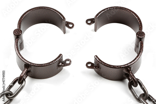 Photo: old style medieval handcuffs made of heavy iron old style medieval handcuffs made of heavy iron