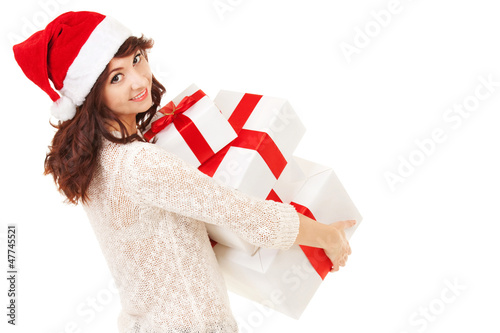 Photo: Happy santa woman with gift boxes Happy santa woman with gift boxes