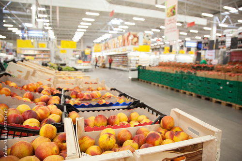 Photo: Boxes of peaches. Boxes of peaches.