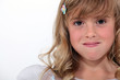 Portrait of a girl with her mouth full