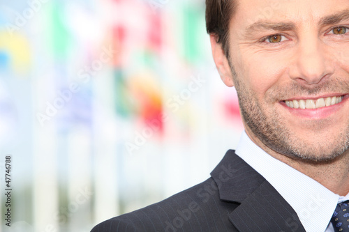 Photo: Businessman standing outside Businessman standing outside