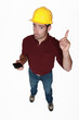 Man with a hardhat with bad news.