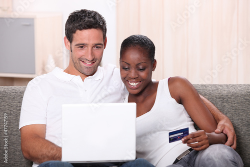 Photo: Couple shopping on the Internet Couple shopping on the Internet