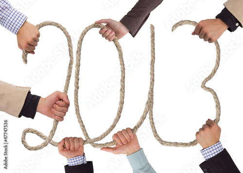 Photo: Hands holding rope forming year 2013 Hands holding rope forming year 2013