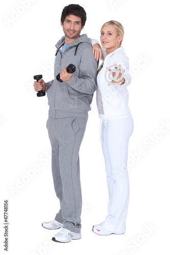 Photo: Couple working out together Couple working out together