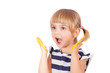 Small girl with yellow paint on her palms