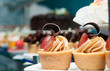 vanilla cupcakes with fresh fruit and icing