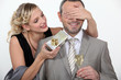 a wife making a surprise to her husband