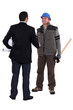 craftsman and businessman shaking hands