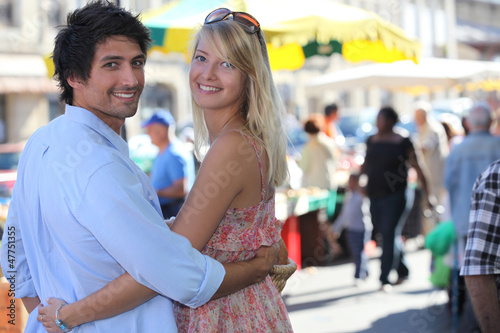 Photo: young couple going to the market young couple going to the market