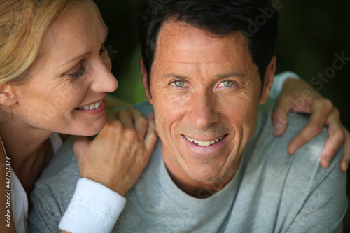 Photo: Middle-aged couple smiling Middle-aged couple smiling