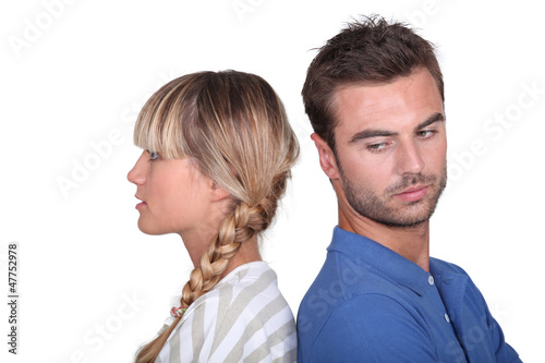 Photo: Couple in a mood with one another Couple in a mood with one another