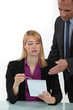 Woman explaining point to boss