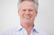 Stock image of a businessman laughing