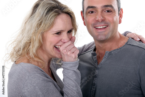 Photo: Loving couple in grey Loving couple in grey