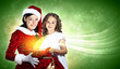 Little girl with christmas gifts and santa