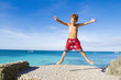 young happy child boy on tropical beach