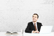 man sitting with notebook