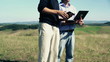 Video: Real-estate agent with tablet computer showing property to inves Real-estate agent with tablet computer showing property to inves