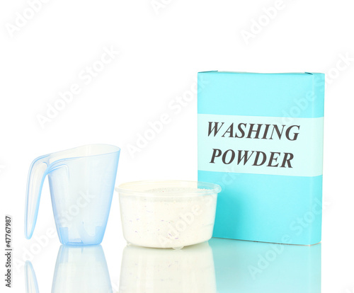 Photo: Box of washing powder with blue measuring cup, isolated on Box of washing powder with blue measuring cup, isolated on