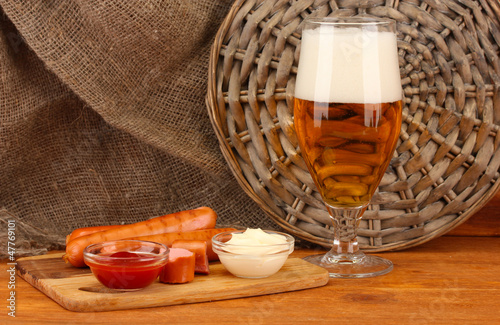 Photo: Beer and grilled sausages Beer and grilled sausages