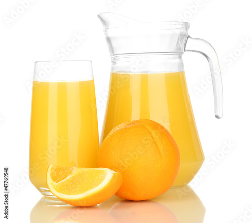 Photo: Full glass and jug of orange juice and oranges isolated on Full glass and jug of orange juice and oranges isolated on