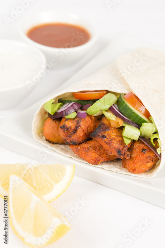Photo: Chicken Tikka Wrap: Tandoori chicken and salad in a flatbread Chicken Tikka Wrap: Tandoori chicken and salad in a flatbread