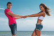 the guy holding the girlfriend