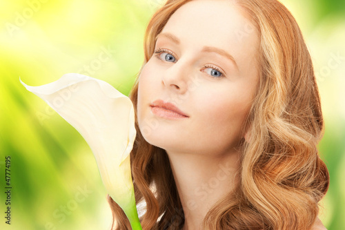 Photo: beautiful woman with calla flower beautiful woman with calla flower