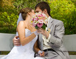 Photo: Bride and groom kissing Bride and groom kissing