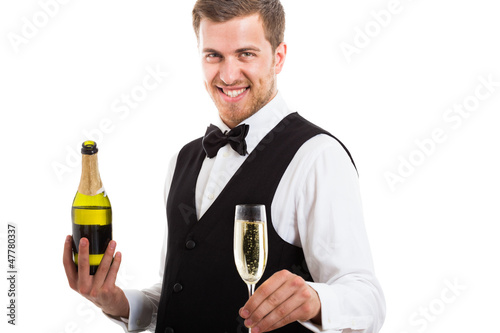 Photo: Waiter serving a champagne flute Waiter serving a champagne flute