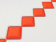 Leather background with red stitched rhombuses