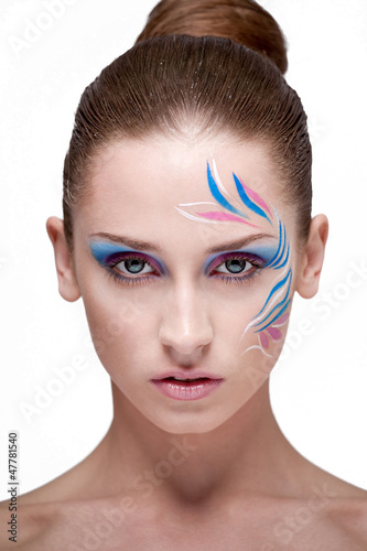 Photo: Fashion make-up with face art. Fashion make-up with face art.