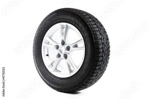 Photo: winter wheel isolated on white winter wheel isolated on white