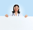 Young female doctor with a banner