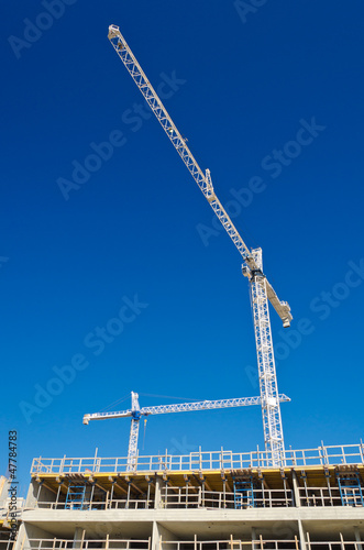 Photo: High-rise building under construction. High-rise building under construction.