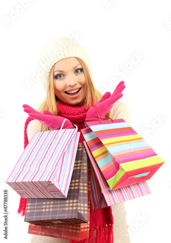 Photo: Attractive young woman woman with lot of shopping bags, Attractive young woman woman with lot of shopping bags,