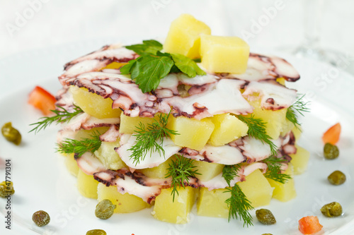 Photo: Octopus pie with potatoes Octopus pie with potatoes