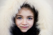 Young girl with  wearing fur hat