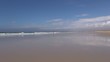 woman comes jogging at beach