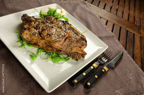 Photo: Grilled beef steak with bone, BBQ meat Grilled beef steak with bone, BBQ meat