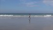woman jogging on seashore