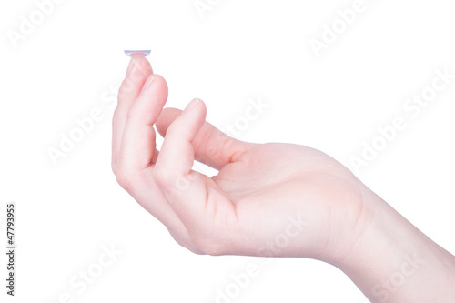 Photo: Woman holds a Contact Lens Woman holds a Contact Lens